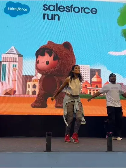 A shot of my team and I guiding the participants through a routine at the Salesforce event. We demonstrate every step clearly, making it easy for employees of all fitness levels to participate and feel successful.