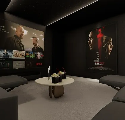 Another view of the lounge concept, showing how movie posters and art can be used to personalize the space and reflect the owner's tastes.