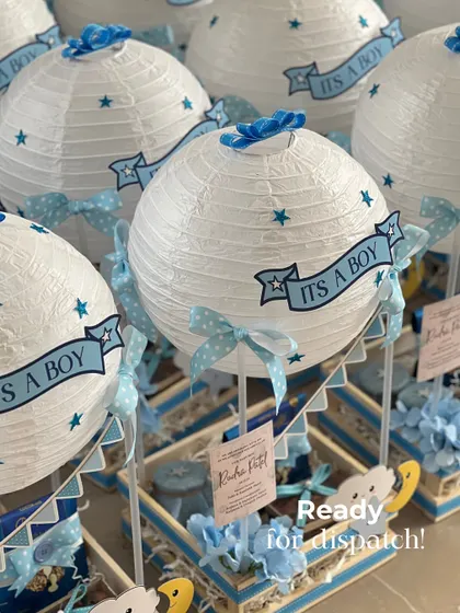 When a client asks for 150 baby announcement hampers, the studio turns into a sea of joy! This was for the 'Cloud Nine' theme, where we created these hot air balloon gifts to share the happy news. It shows how I handle large, custom orders with the same love and attention to detail.