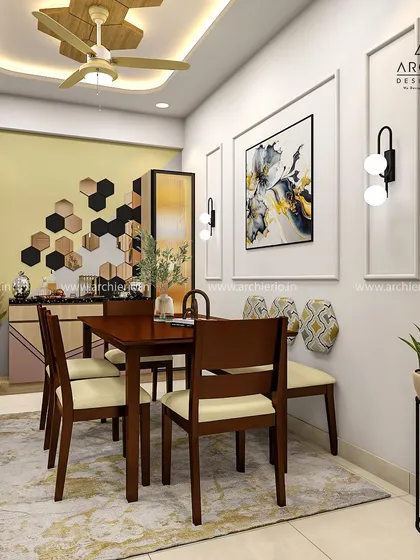 A dining room with a playful bee and honeycomb theme. The design is creative and personal, using hexagonal mirrors and a warm yellow accent wall.