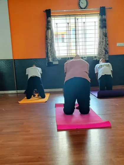The class practices Ustrasana, or Camel Pose, a deep backbend that opens the chest and throat. We focus on lifting the heart to the sky, creating a feeling of openness and release.