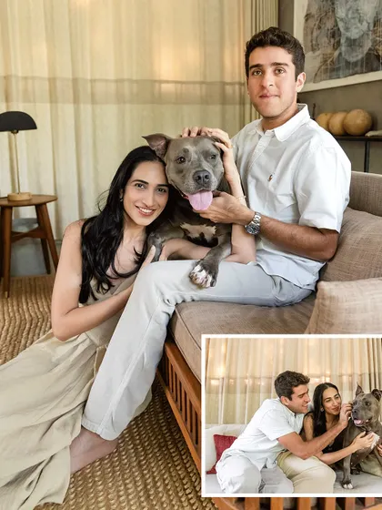 An indoor shot from the Alibaug engagement session. The warm, natural light and cozy setting create a beautifully intimate portrait of the couple and their beloved dog.