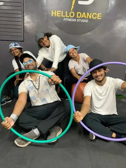 Our instructors and students having fun with hula hoops. It's not just about serious practice, it's about enjoying the process.