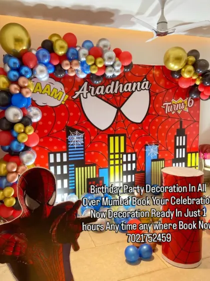 Another look at my popular Spider-Man theme, this time with a full backdrop showing the city skyline. The setup includes a life-sized Spider-Man cutout, perfect for taking pictures with.