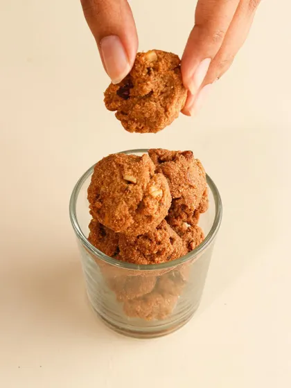 Sometimes, simplicity is the most effective approach. This minimalist shot of bite-sized cookies uses clean lighting and a simple composition to highlight the product's texture and appeal, perfect for a modern, understated brand identity.