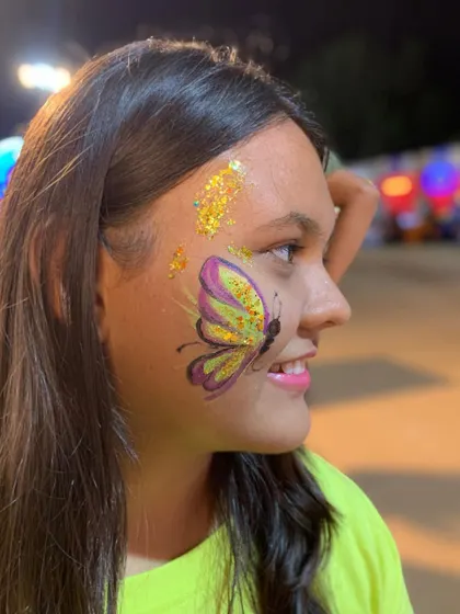 A yellow and pink butterfly, looking bright and cheerful.