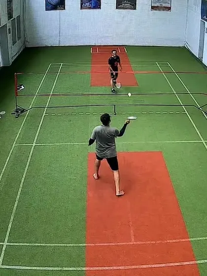 An overhead view of a singles match, showing great court coverage.