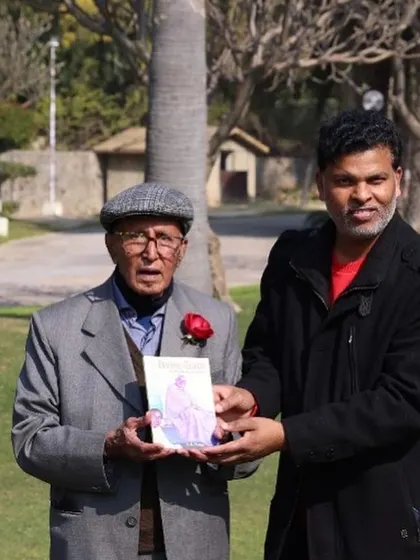 Presenting a book to RS Yadav ji. Learning from devoted souls like him is a blessing and provides a role model for living a life of service and faith.