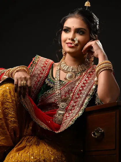 Another angle of the Maharashtrian bridal look, showing how the hair is styled to support the traditional jewelry. I emphasize creating a strong foundation in hairstyling.