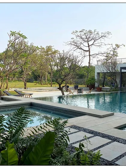 "Home is where the pool is" was the guiding principle for this Alibaug residential project. Engulfed by greenery and featuring a stunning pool, this home is the epitome of leisurely living.