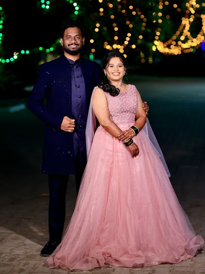 A full-length shot of the couple, capturing the fairytale feel of their engagement celebration.