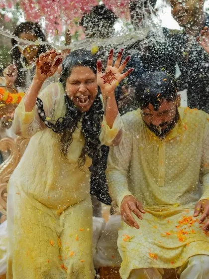 A Haldi ceremony that turned into a full-blown party. We love when celebrations are this energetic, allowing us to capture incredibly fun and dynamic candid shots.