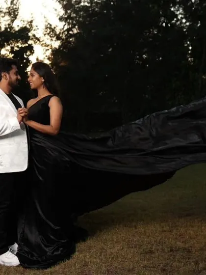 A classic black and white combination for a pre-wedding shoot. The black flying gown and white blazer are both available for rent.