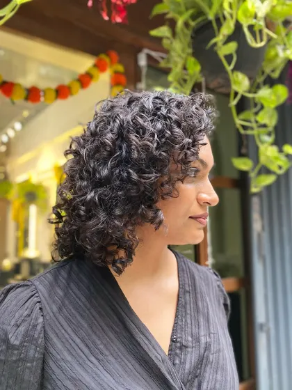 More examples of my short curly haircuts, from bobs to layered chops, each one personalized to the client's curl pattern and face shape.