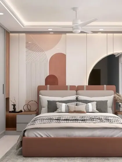 A bedroom with a soft, artistic aesthetic, featuring a large, round mirror and a custom headboard with a geometric-patterned wall panel in pastel shades.