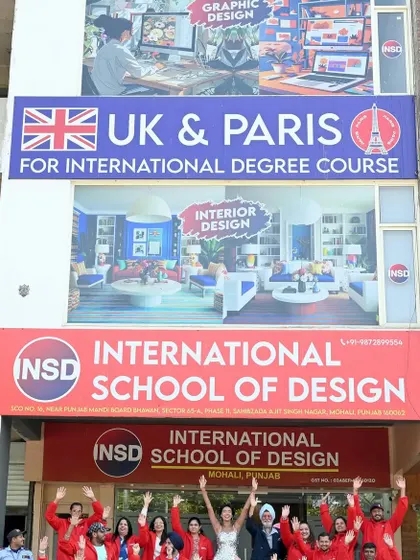 An exterior shot of the INSD campus with the team. This is a great branding image that establishes a sense of place and community.