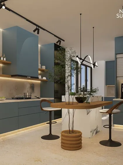 A full view of our exquisite kitchen design at Ireo Gurgaon Hills. The soothing ash blue cabinetry, marble island, and smart lighting create a perfect blend of contemporary design, natural elements, and functional luxury.