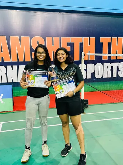Celebrating Prishita Sinha's double victory at the Yonex-Sunrise Raigad District Championship. She secured first place in both Senior Women's Doubles and Senior Mixed Doubles.