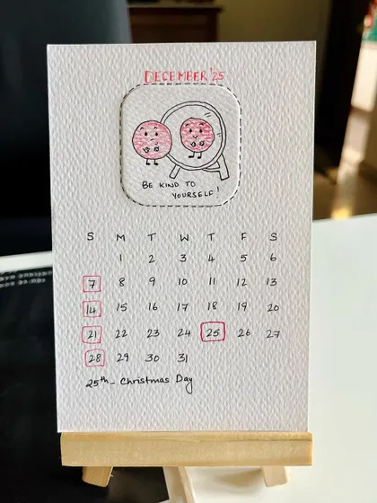 December's doodle is a simple but important message for the holiday season: "Be kind to yourself".