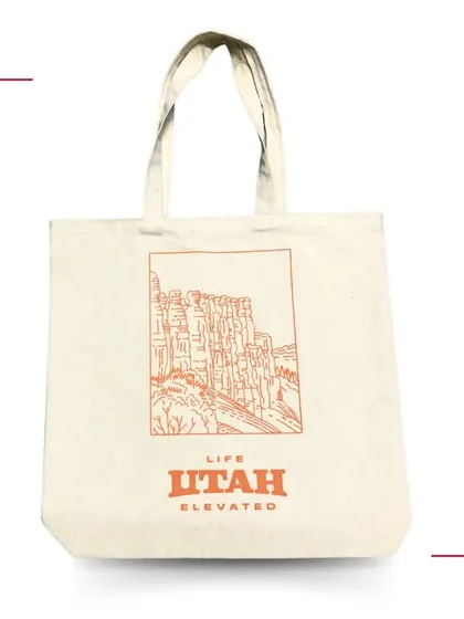 A custom-printed tote bag for the 'Life Elevated Utah' campaign. These eco-friendly bags are perfect for corporate events and giveaways.