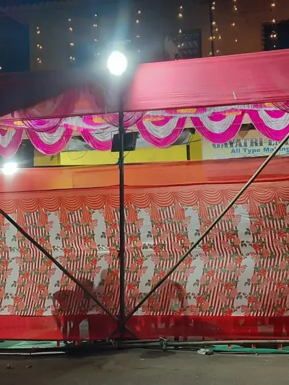 The basic structure of a pandal with printed fabric walls. I can customize the look with different types of drapes.