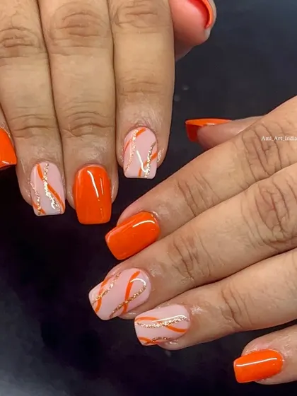 Bright orange paired with a glittery swirl design. A fun and energetic combination.
