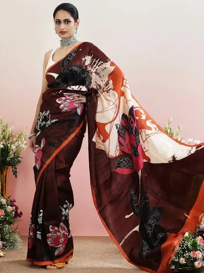 The full view of the brown abstract floral saree, a statement piece for the modern woman.