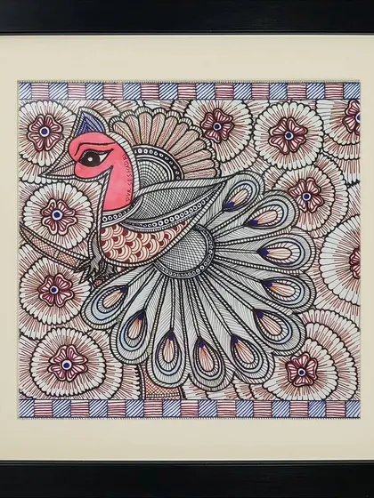 A peacock is rendered with incredible detail against a floral background in this Madhubani piece by Pramod. The fine line work in the feathers and flowers is a testament to the artist's patience and skill.