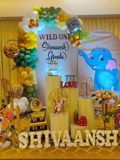 Another take on the popular jungle theme, this time for Shivaansh's first birthday. We used a golden curtain backdrop and animal print balloons to add a touch of glam to the wild adventure.