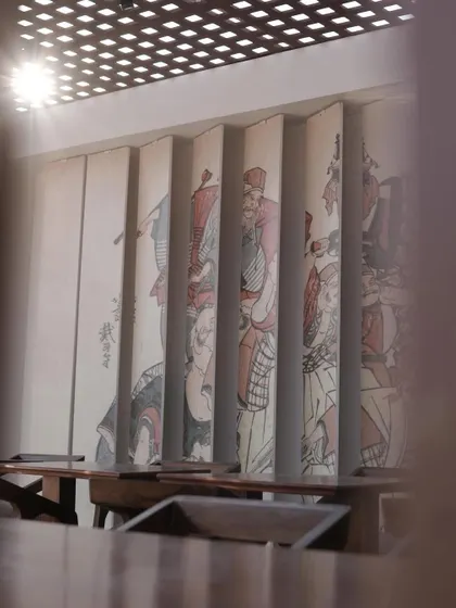 A view of the Japanese art mural inside the Ebisu dining space. The artwork was printed on folding panels, adding an authentic and artistic element to the pop-up's interior design.