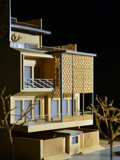 This architectural model of the Screen House was a crucial step in visualizing the design. It helped refine the interplay of the screened volumes, open terraces, and the overall massing for a family of six.