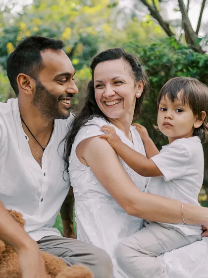 A family portrait where the little boy is looking a bit serious. It's important to capture all facets of a child's personality.