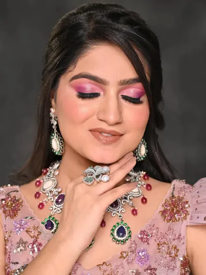 Another angle showing the flawless blending of the pink and purple eyeshadows for this dramatic cut-crease look.