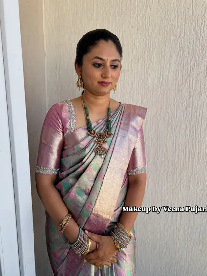 A full-length view of Shreeja's elegant house warming look.