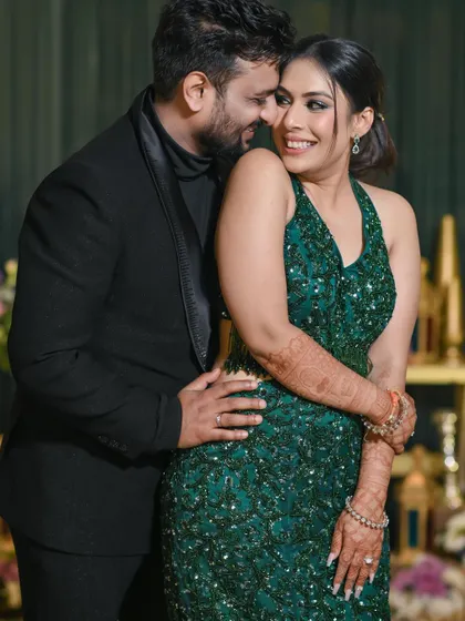 A tender moment captured during the cocktail party. The groom whispers to his bride, and her happy expression says it all. It's these small, intimate interactions that I love to document.