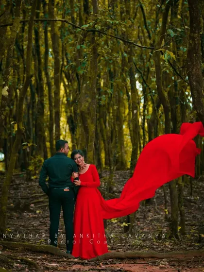 Another beautiful shot in the woods, where the flowing trail of the gown adds a touch of magic to the scene. This gown is a favorite for couples wanting fairy-tale-like photos.