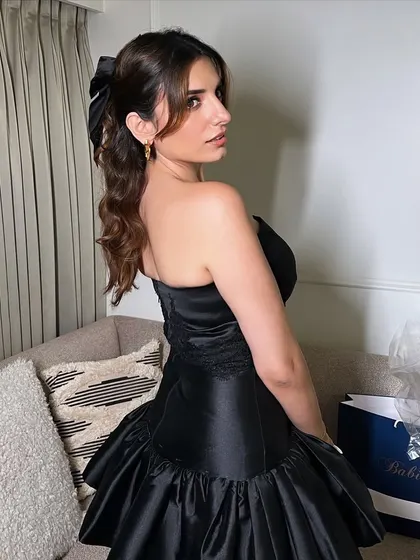 Another beautiful shot of Prakriti's look. The soft glam makeup and simple styling create a look that is both modern and timeless.