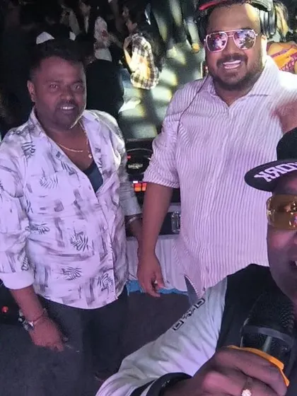 A selfie with my friend and fellow DJ, DJ Wink, at the Butterfly corporate event. It's always great to work with talented friends.