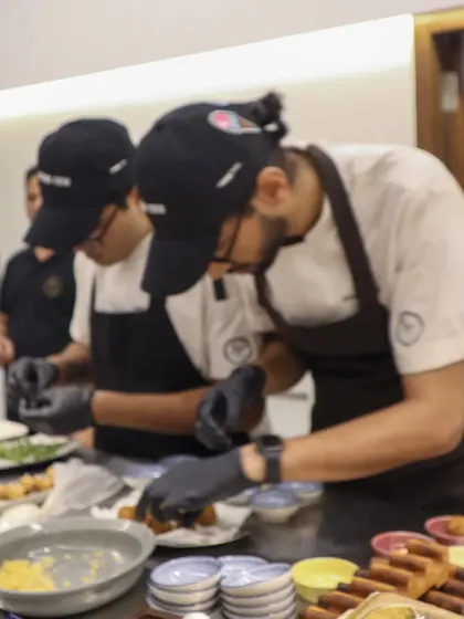 My chefs working together in the kitchen, focused and passionate about their craft.
