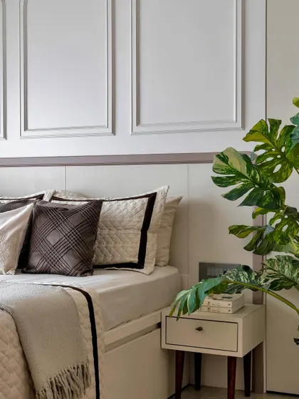 I believe in infusing spirituality into the heart of the home. This serene bedroom includes a dedicated Mandir corner, creating a peaceful sanctuary for both rest and devotion, seamlessly integrated into the room's design.