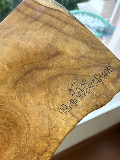 A closer look at the custom logo I engraved on this wooden cheeseboard. I love experimenting with my skills, and seeing the final product come to life from the initial draft is so rewarding.
