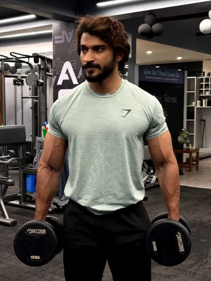 Beast mode, all day every day. A shot with dumbbells, ready for the next set.