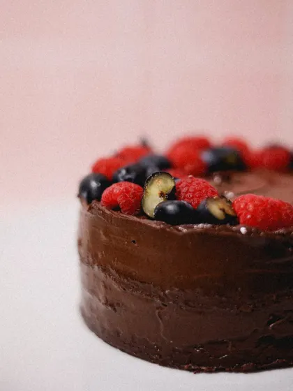 Our Chocolate Berry Cake is perfect for when you want a bit of everything. Topped with a medley of fresh raspberries, blueberries, and strawberries, it's both beautiful and delicious.