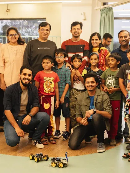 Our Robotics showcase at the Whitefield hub. A group of proud students, parents, and teachers pose with the autobots they built, celebrating their journey of tinkering and innovation.