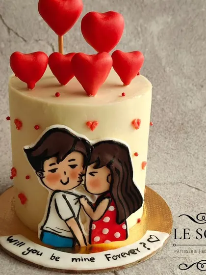 This tiny 300-gram Chocolate Raspberry mini cake was for a proposal. I'm still amazed I managed to get the detailed couple art right on such a small canvas.