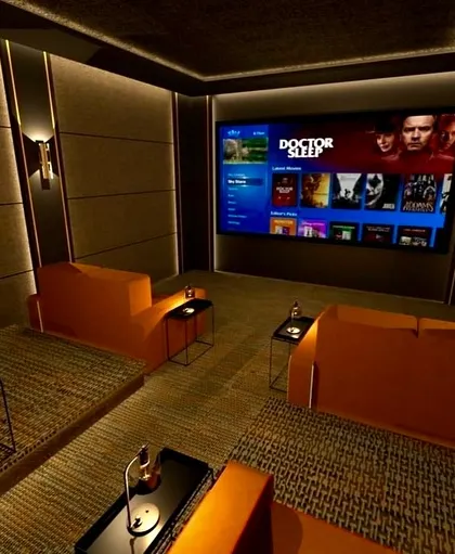 A vibrant, modern design using bold orange seating. This shows that home theaters don't have to be dark and neutral; they can be full of personality and color.