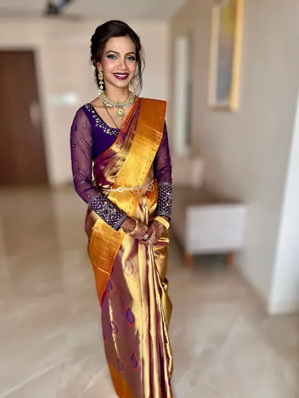 The full look, showing how the makeup and traditional attire create a harmonious and elegant appearance.
