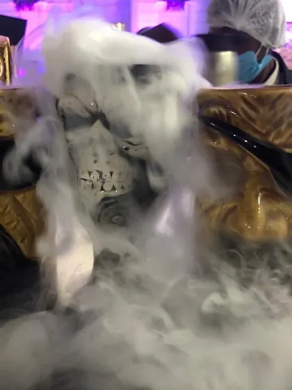 A close-up of our themed drinkware, with smoky dry ice adding a theatrical element to the presentation of cocktails and mocktails.