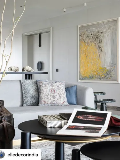 This living room features a palette of blues and greys, akin to Bangalore's overcast skies. Amid swathes of tonal textures and eye-catching art, the home pulls off a clever balancing act that stays true to its residents.