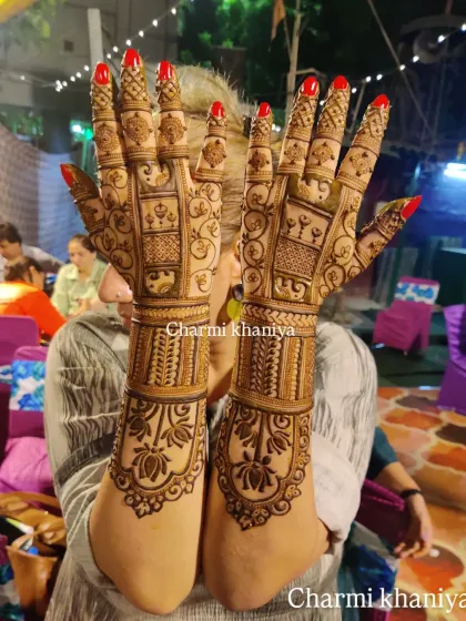 Let your hands do the talking! A beautiful, full-coverage design with lotus motifs and intricate checkerboard patterns.